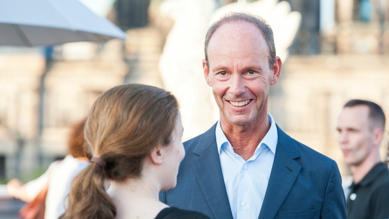 Bertelsmann CEO Thomas Rabe with writer Thea Dorn