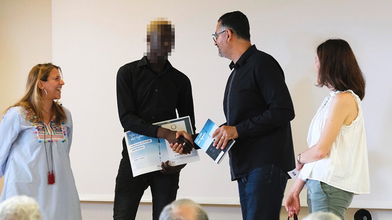 Presentation of the award to one of the winners