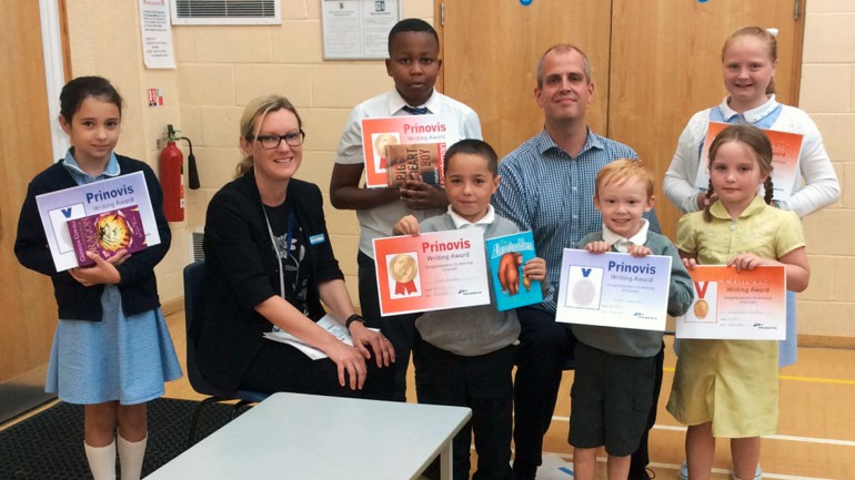 Katherine Brown and Matthew Cox of Prinovis UK presented the certificates and book prizes to the winners